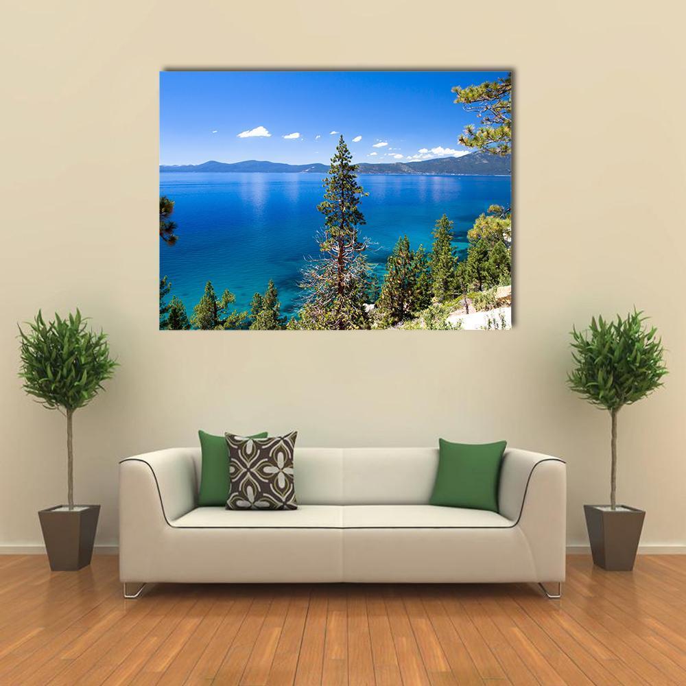 Lake Tahoe Mountains and Pine Trees Canvas Wall Art in green and blue, single panel hung on a wall