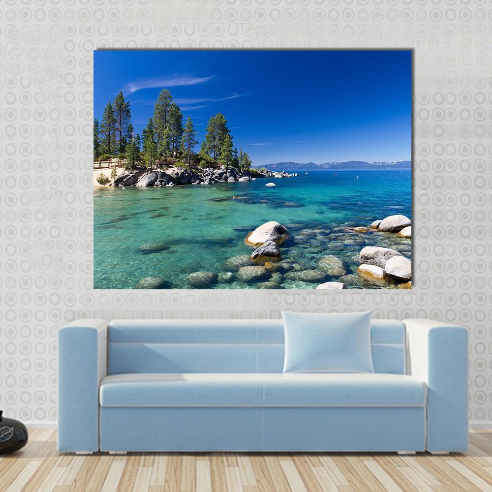 Lake Tahoe Landscape Canvas Wall Art in green and blue, single panel hung on a wall