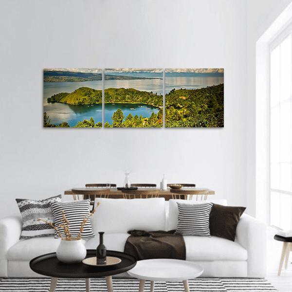 Lake Toba Hillside Village Overlooking Bay Panoramic Canvas Wall Art in green and blue, hung on a wall