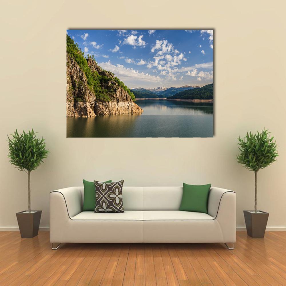 Lake Vidraru, Romania Canvas Wall Art in brown, green and blue, single panel hung on a wall