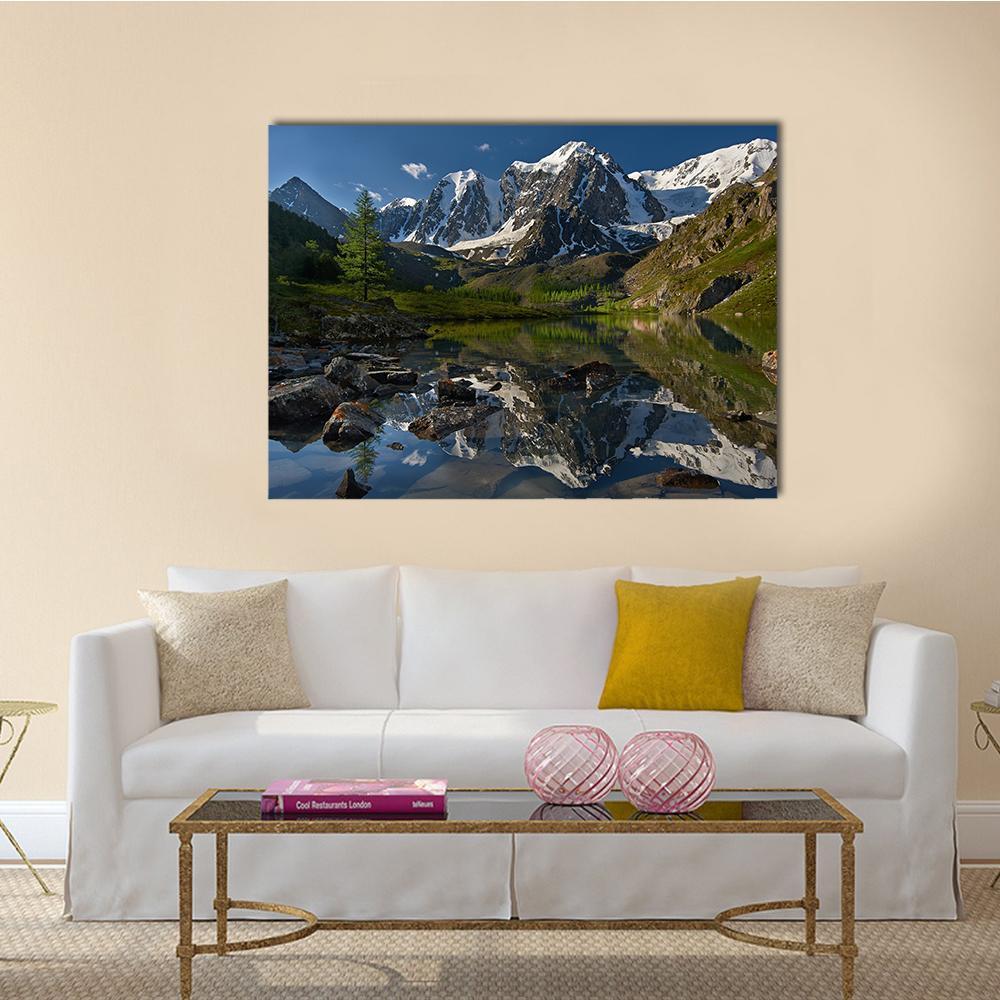 Lake with Snow-capped Peaks Canvas Wall Art in white, green and blue, single panel hung on a wall