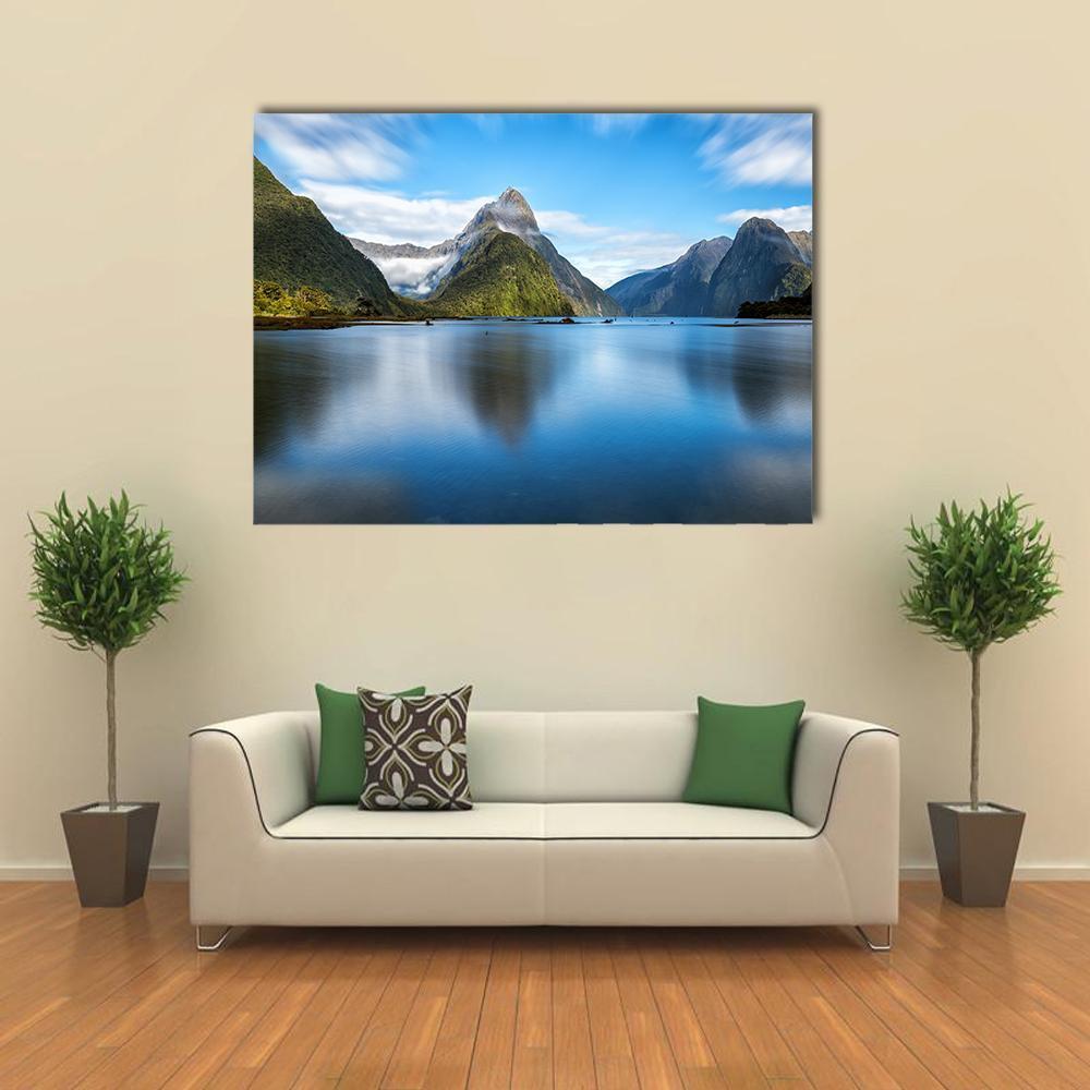 Mitre Peak Reflected in Lake Canvas Wall Art in white, green and blue, single panel hung on a wall