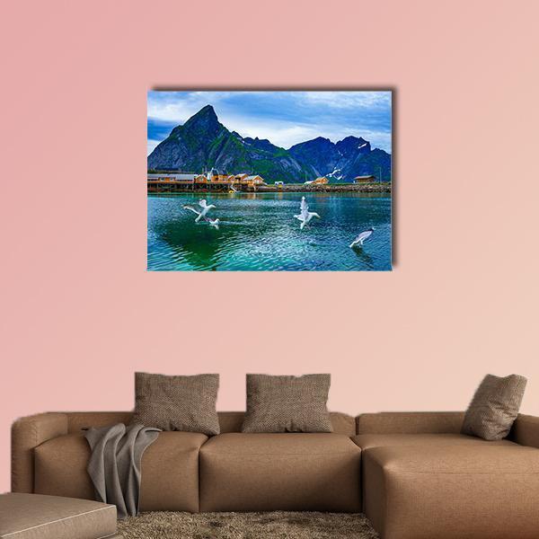 Norway Fjord with Jagged Mountain Peak Canvas Wall Art in green and blue, single panel hung on a wall
