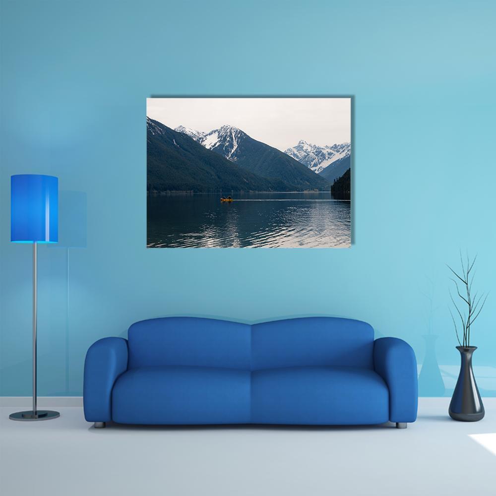 Lake with Snow-capped Mountains and Yellow Boat Canvas Wall Art in white, gray and blue, single panel hung on a wall