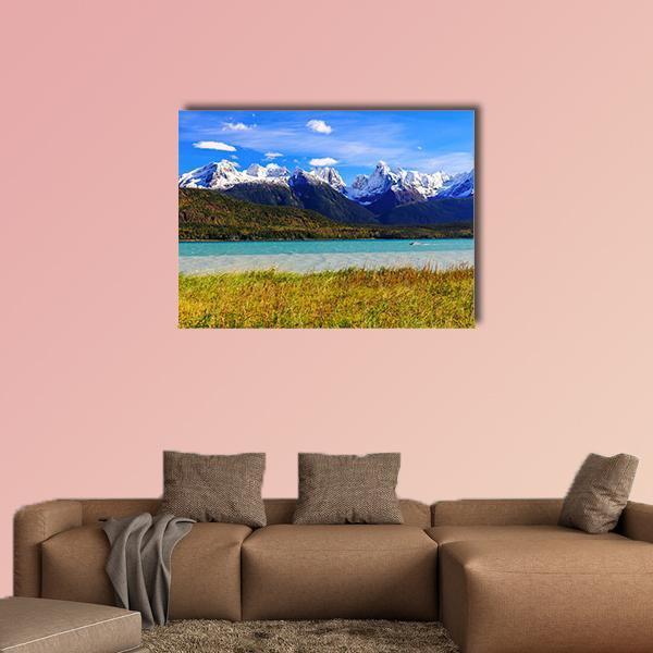 Lake with Sinclair Mountain Canvas Wall Art in white, green and blue, single panel hung on a wall