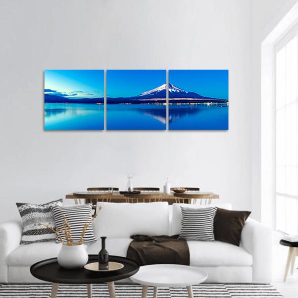 Mount Fuji Reflection at Lake Yamanaka Panoramic Canvas Wall Art in white and blue, hung on a wall