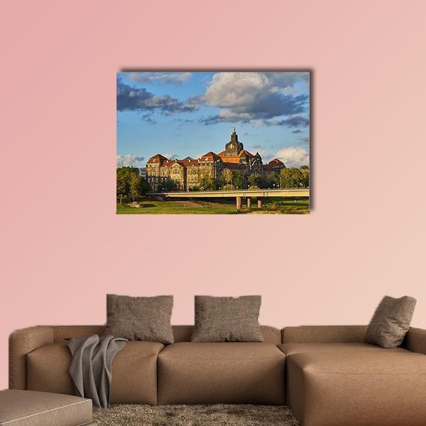 Baroque Cityscape with Dome and Bridge Canvas Wall Art in beige, brown and blue, single panel hung on a wall