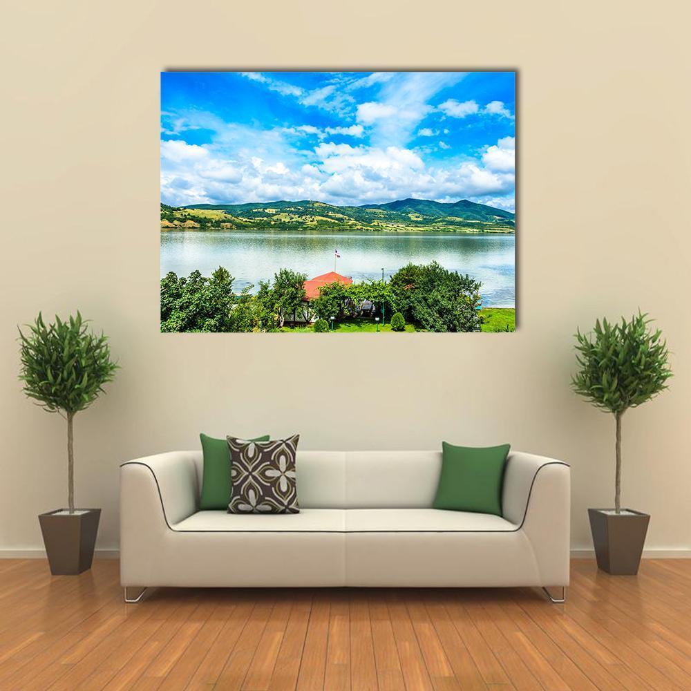 Backyard on Danube River Canvas Wall Art in white, green and blue, single panel hung on a wall
