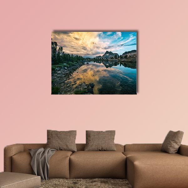 Sierra Nevada Lake at Sunset Canvas Wall Art in orange, yellow and blue, single panel hung on a wall