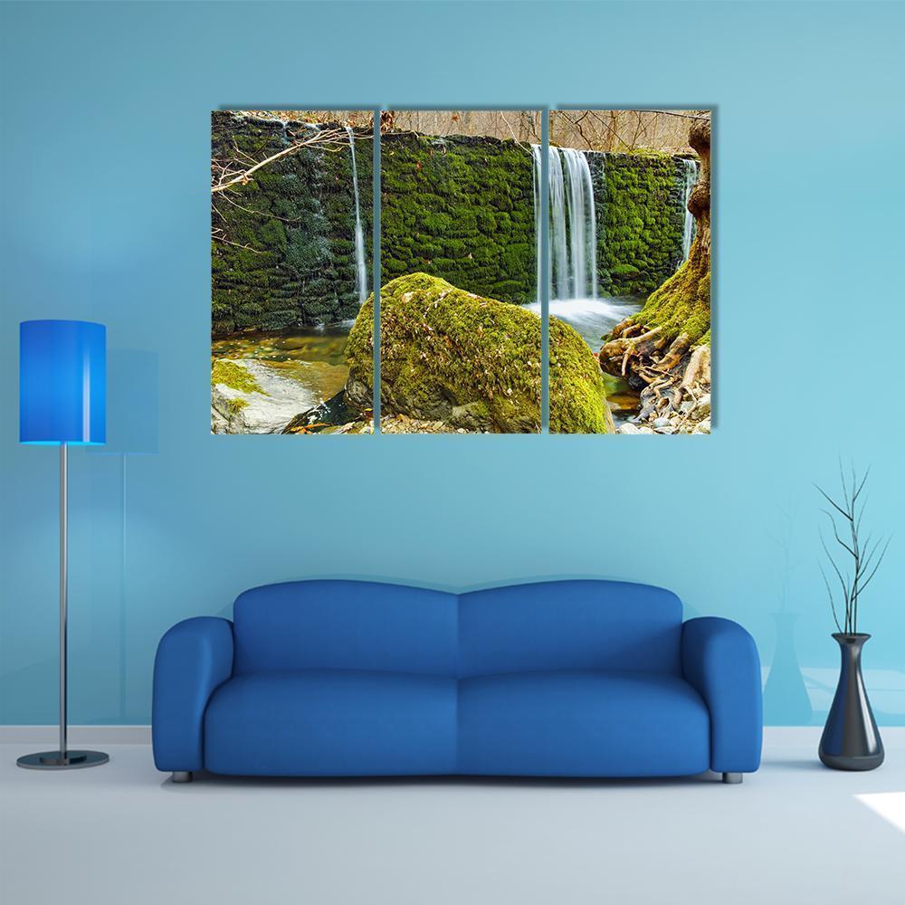 Waterfall on Crazy Mary River Canvas Wall Art in white, brown and green, 3 panel horizontal set hung on a wall