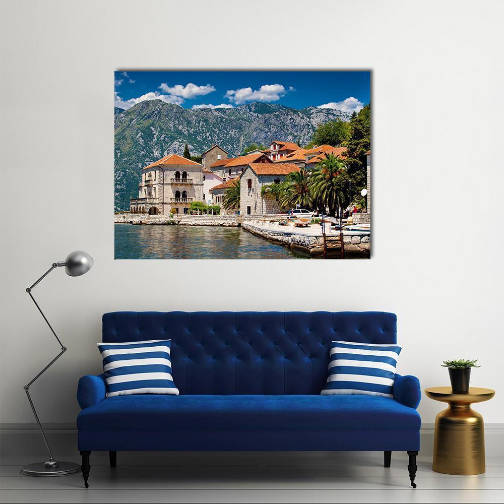 Perast Harbor with Red Tiled Roofs Canvas Wall Art in gray, orange and blue, single panel hung on a wall