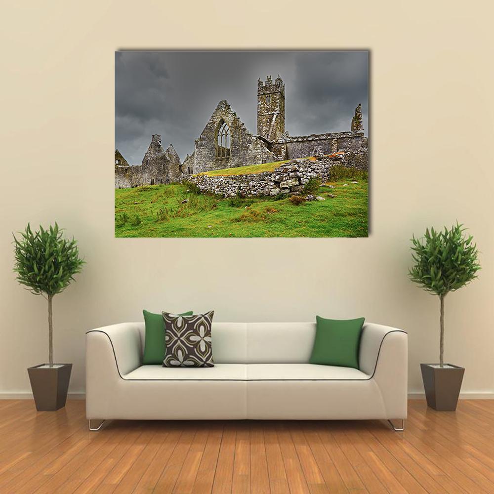 Ross Friary Ruins on Grassy Hill Canvas Wall Art in gray and green, single panel hung on a wall