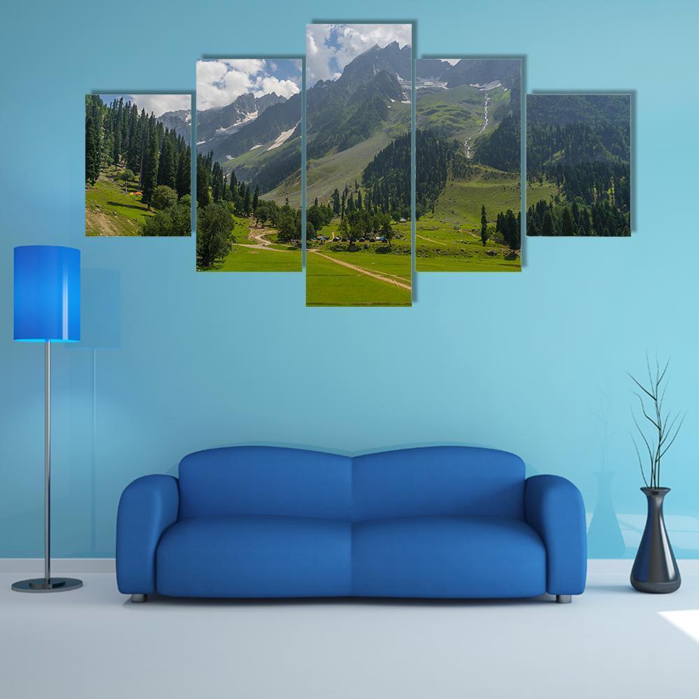 Mountain Valley with Winding Dirt Road Canvas Wall Art in white, green and blue, 5 panel Star layout hung on a wall