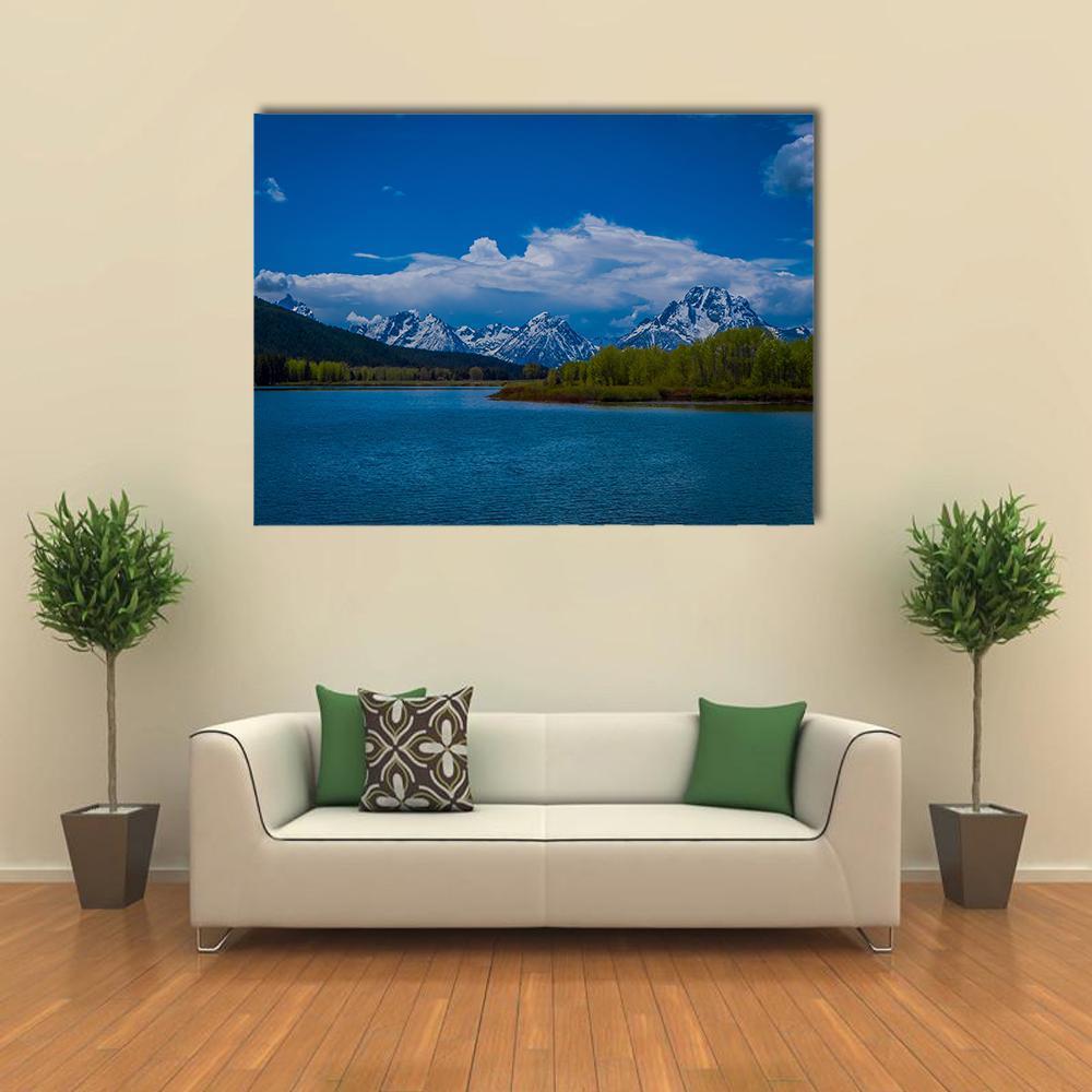 Yellowstone River with Snow-capped Mountains Canvas Wall Art in white, green and blue, single panel hung on a wall
