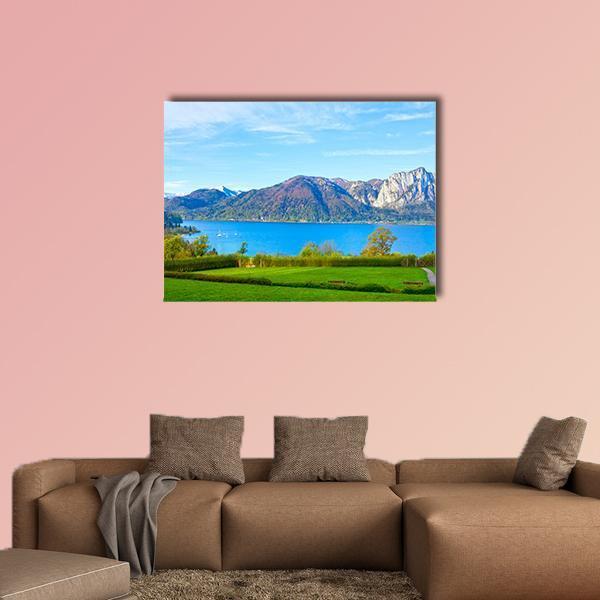 Austrian Lake Landscape with Mountains Canvas Wall Art in brown, green and blue, single panel hung on a wall