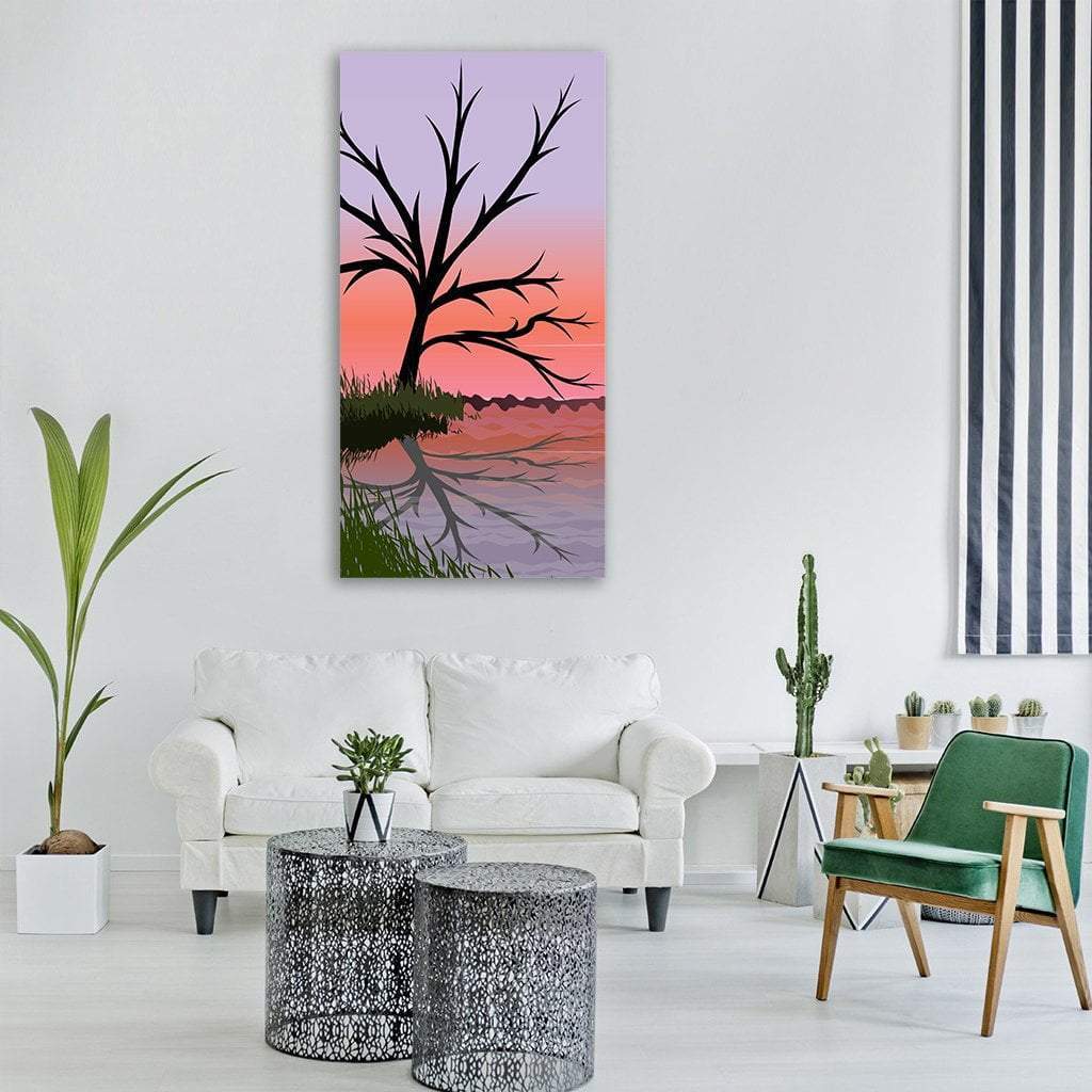 Tree Silhouette Over Sunset Lake Vertical Canvas Wall Art in black, orange and purple, single vertical panel hung on a wall
