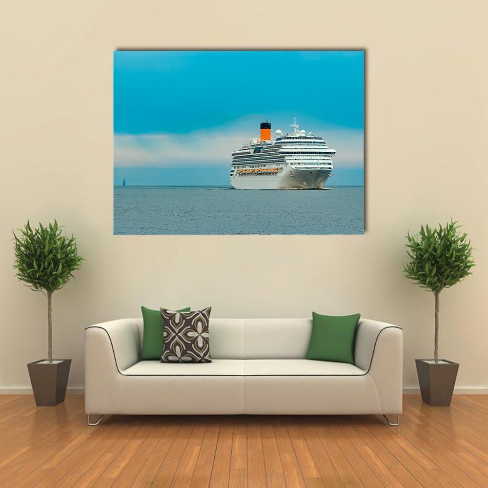 Large Royal Cruise Ship at Sea Canvas Wall Art in white and blue, single panel hung on a wall
