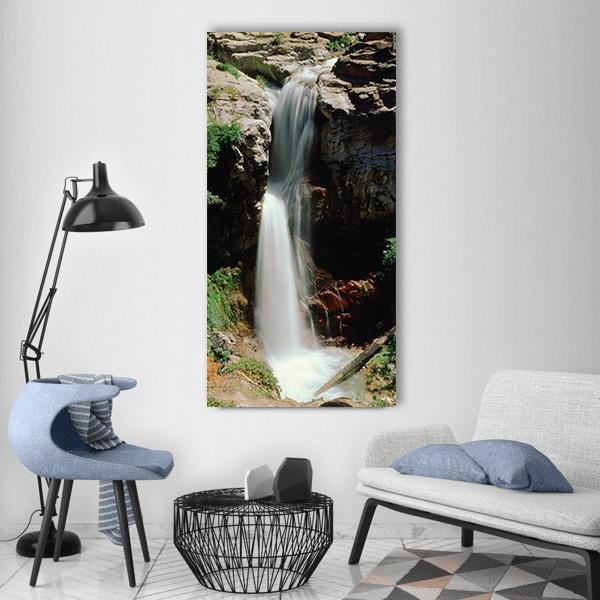 California Park Falls Vertical Canvas Wall Art in white, brown and green, single vertical panel hung on a wall