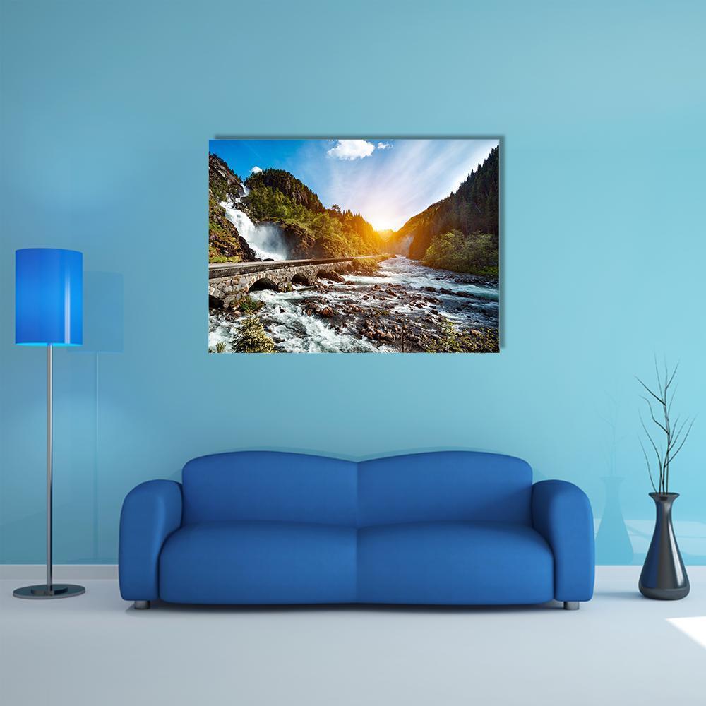 Latefossen Waterfall Canvas Wall Art in white, green and blue, single panel hung on a wall