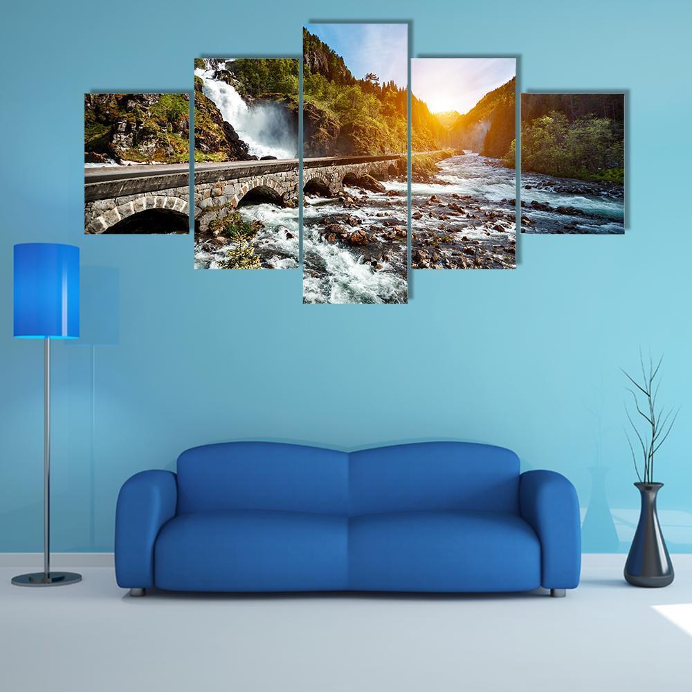 Latefossen Waterfall and Stone Bridge Canvas Wall Art in white, green and blue, 5 panel Star layout hung on a wall