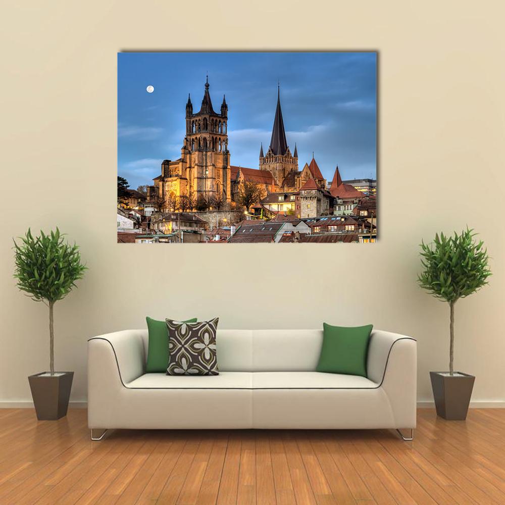 Lausanne Cathedral at Twilight Canvas Wall Art in brown, gold and blue, single panel hung on a wall