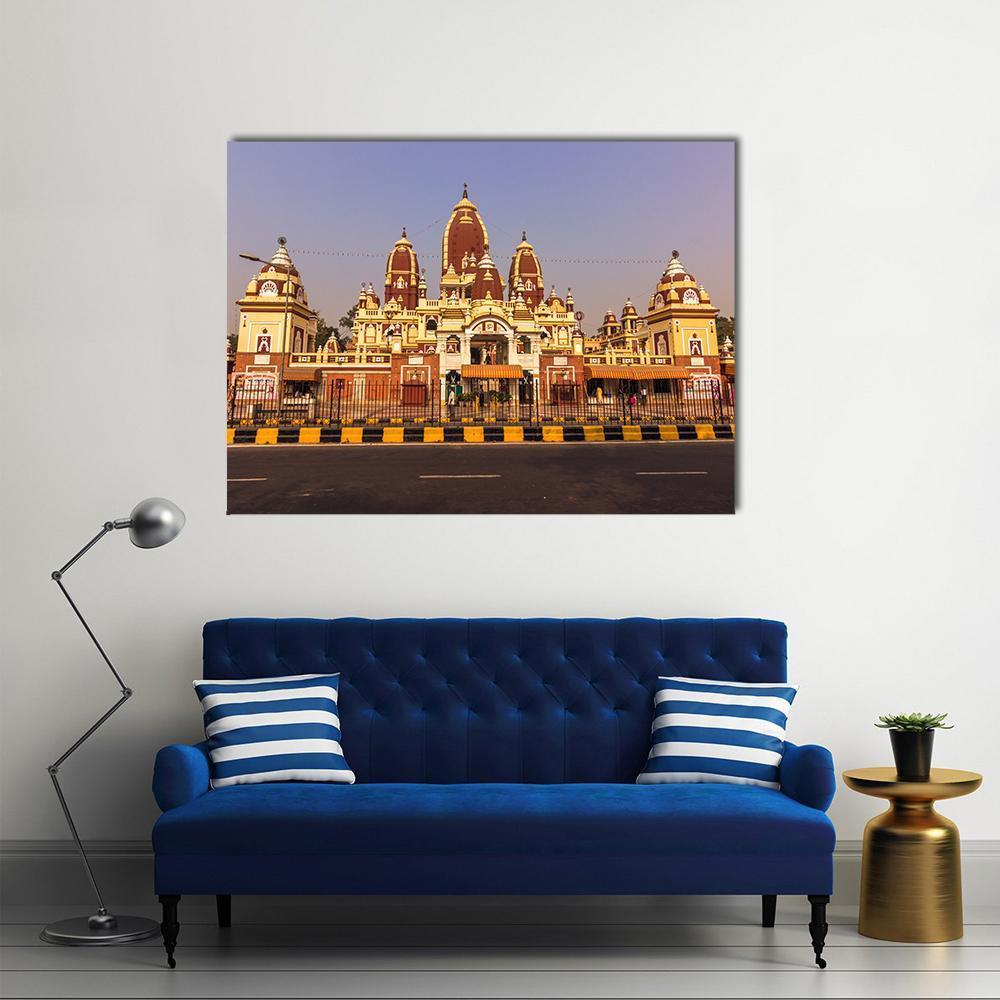 Laxminarayan Temple Artwork Canvas Wall Art in red, yellow and purple, single panel hung on a wall
