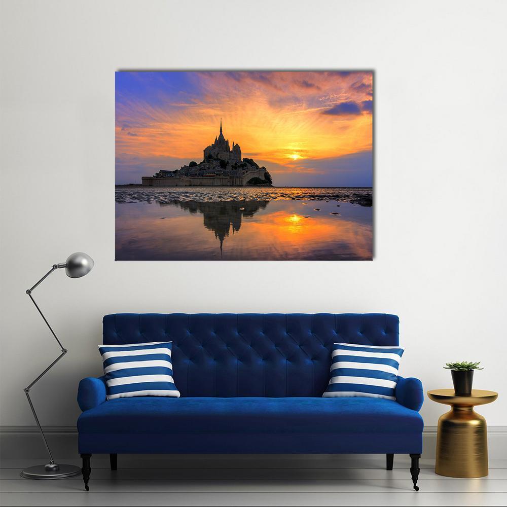 Le Mont Saint-michel at Sunset Canvas Wall Art in orange, yellow and blue, single panel hung on a wall