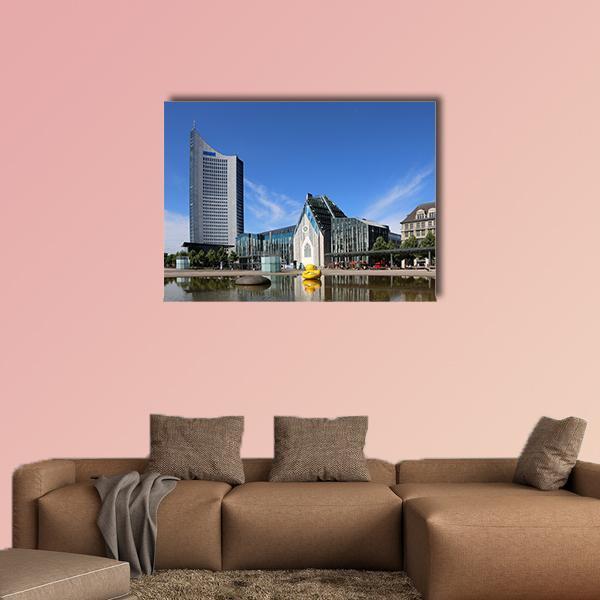 Leipzig City with Yellow Rubber Duck Canvas Wall Art in gray, yellow and blue, single panel hung on a wall