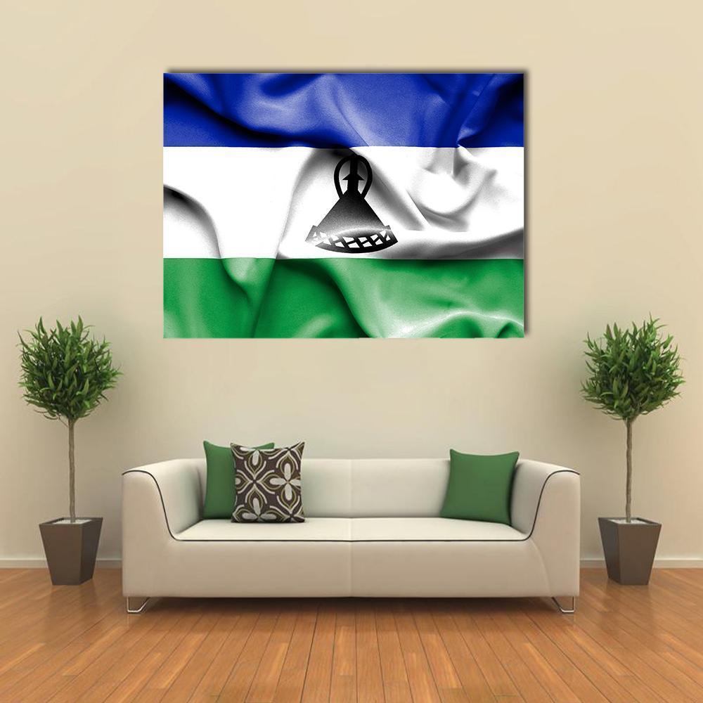 Waving Lesotho Flag Canvas Wall Art in white, green and blue, single panel hung on a wall