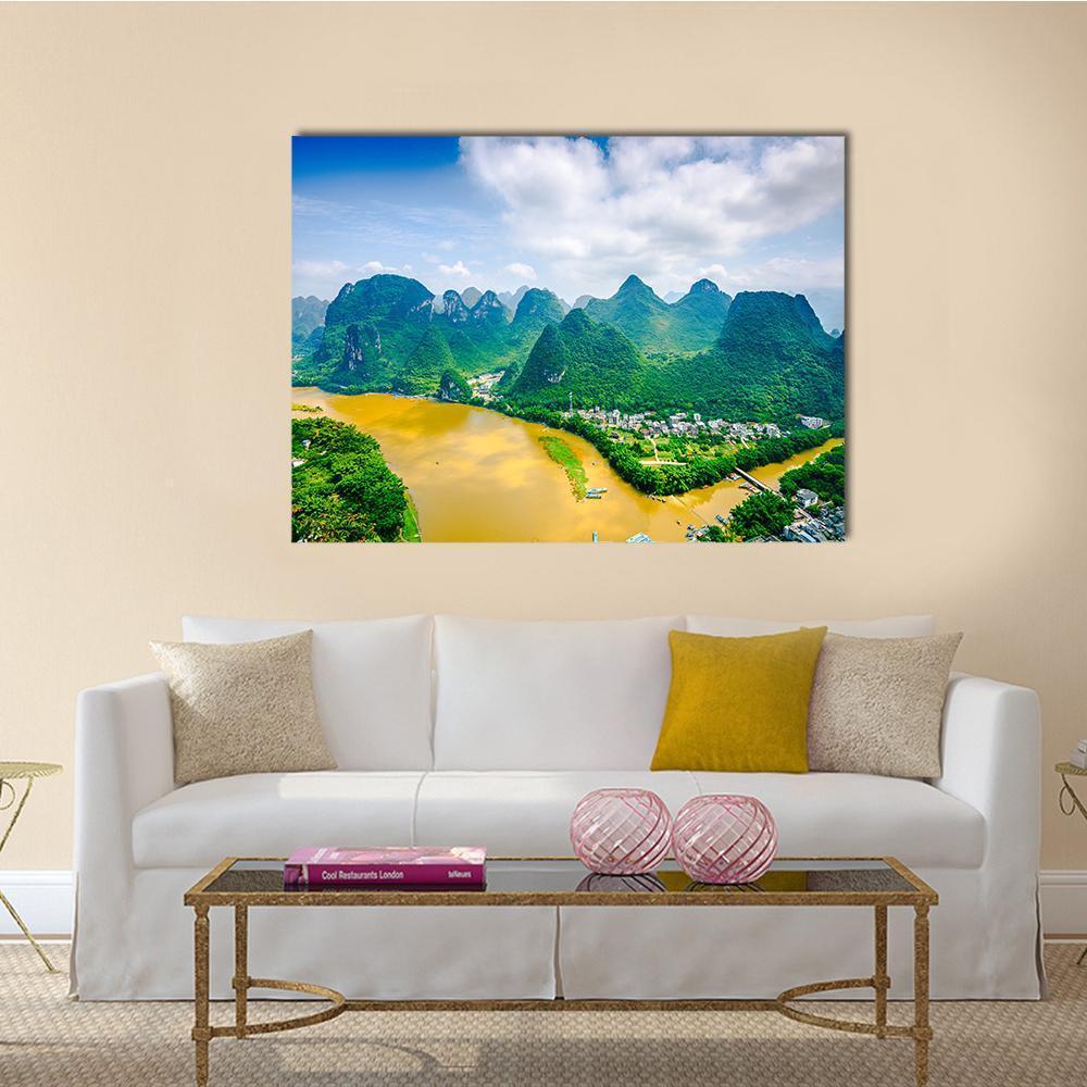 Li River in Rural Guilin Canvas Wall Art in yellow, green and blue, single panel hung on a wall