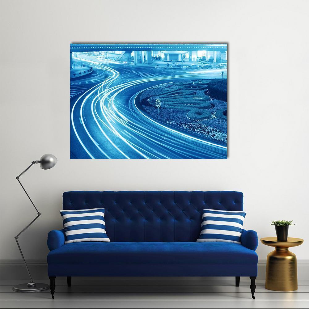 Light Trails in Shanghai Canvas Wall Art in white and blue, single panel hung on a wall