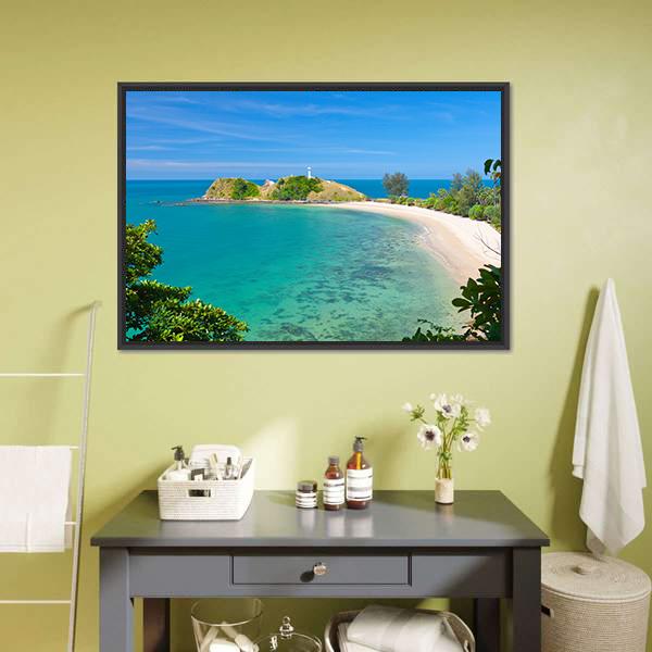 Tropical Beach with White Lighthouse Canvas Wall Art in green and blue, framed canvas, product view on a white background