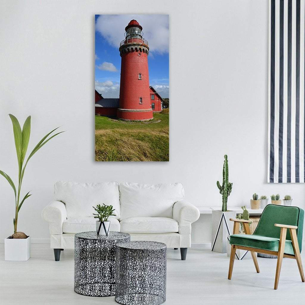 Red Lighthouse in Denmark Vertical Canvas Wall Art in red, green and blue, single vertical panel hung on a wall
