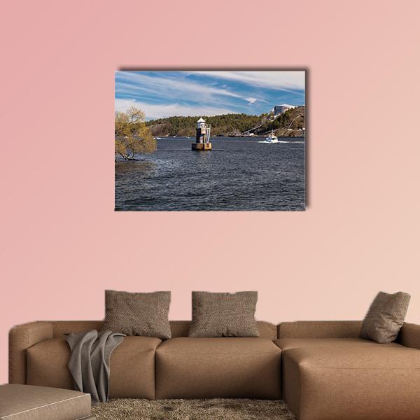 Lighthouse on Lake Malaren Canvas Wall Art in white, brown and blue, single panel hung on a wall