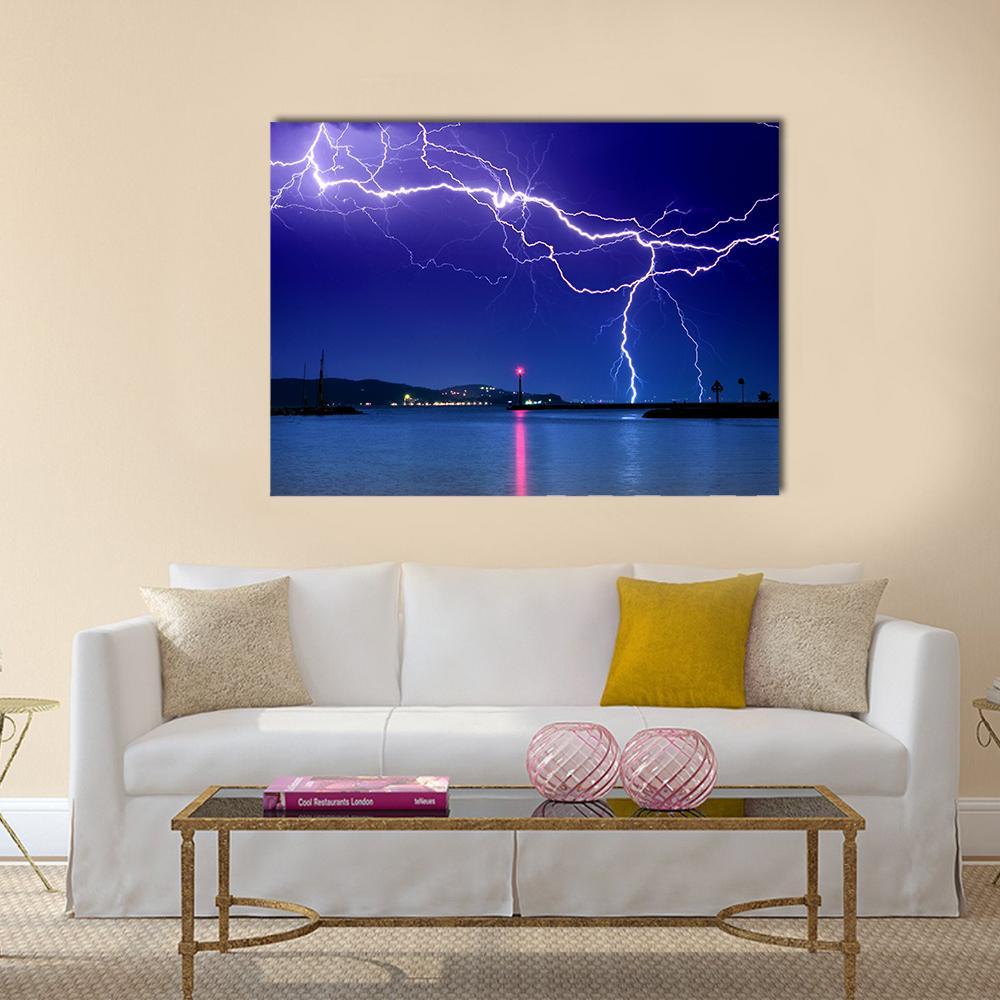 Dramatic Lightning Over Lake Scene Canvas Wall Art in white, blue and purple, single panel hung on a wall