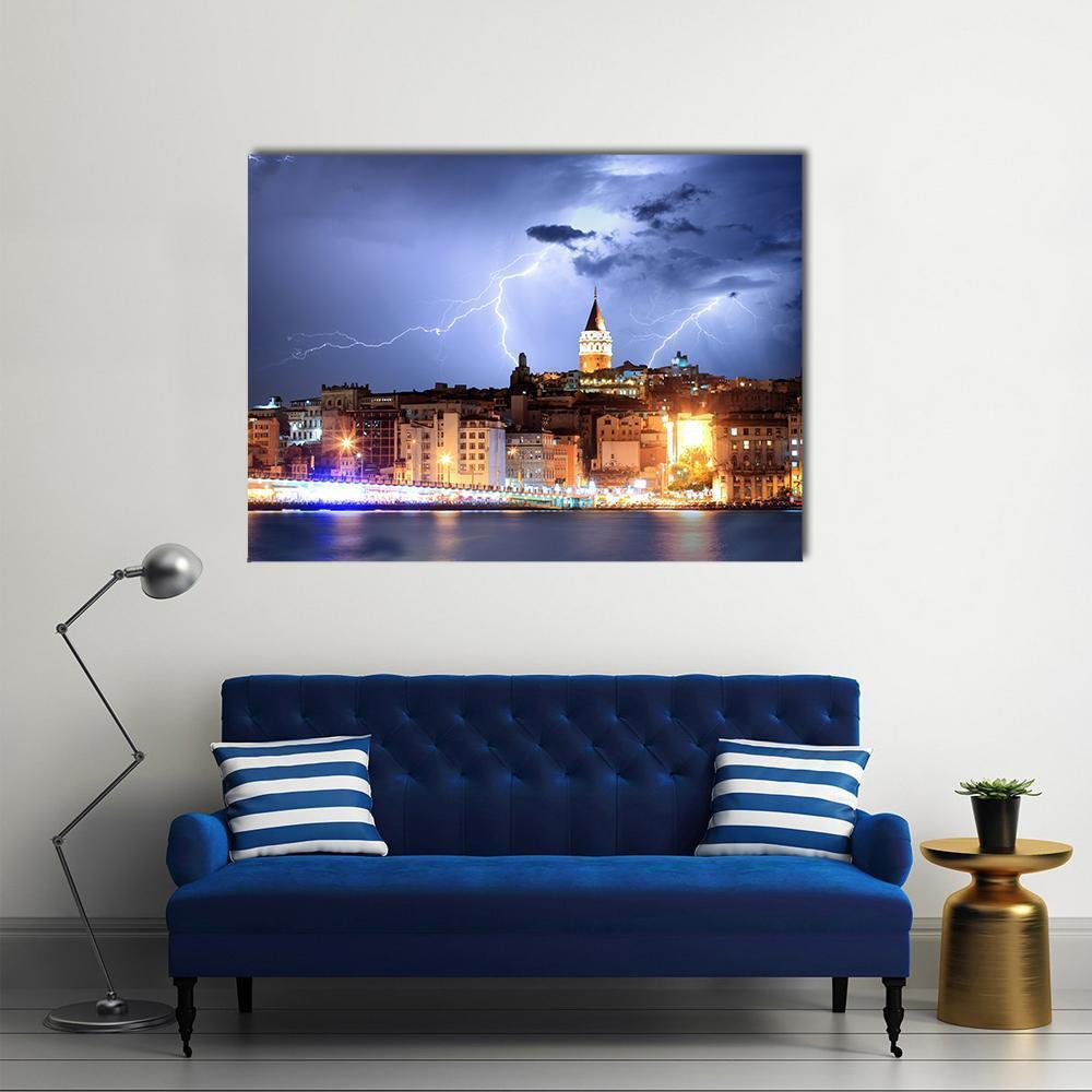 Lightning Strikes Over Galata Tower, Istanbul Canvas Wall Art in yellow, blue and purple, single panel hung on a wall