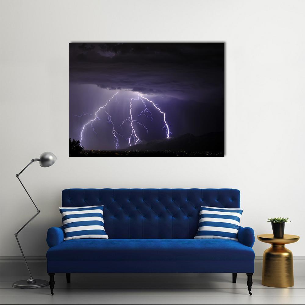 Lightning Over Tucson Valley Canvas Wall Art in black, blue and purple, single panel hung on a wall