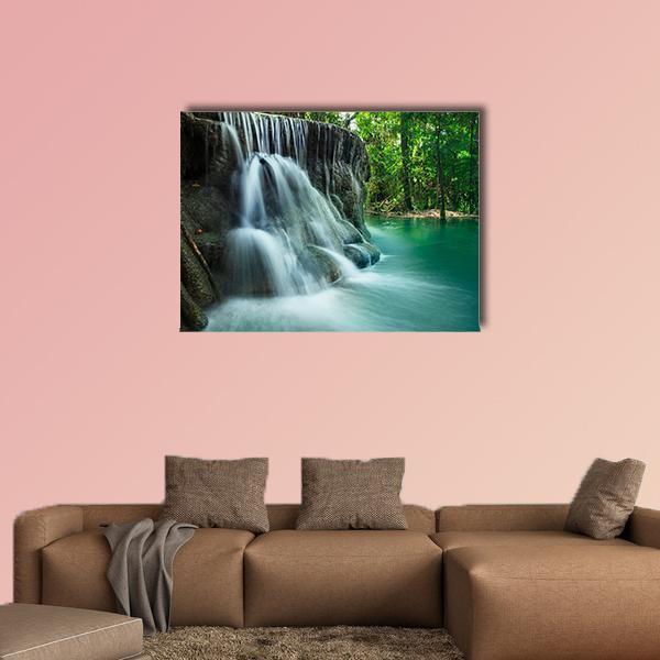 Limestone Waterfall Over Emerald Pool Canvas Wall Art in white, gray and green, single panel hung on a wall