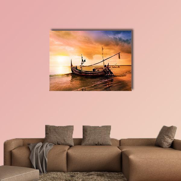 Jangar Boat on Sunset Shore Canvas Wall Art in orange, yellow and blue, single panel hung on a wall