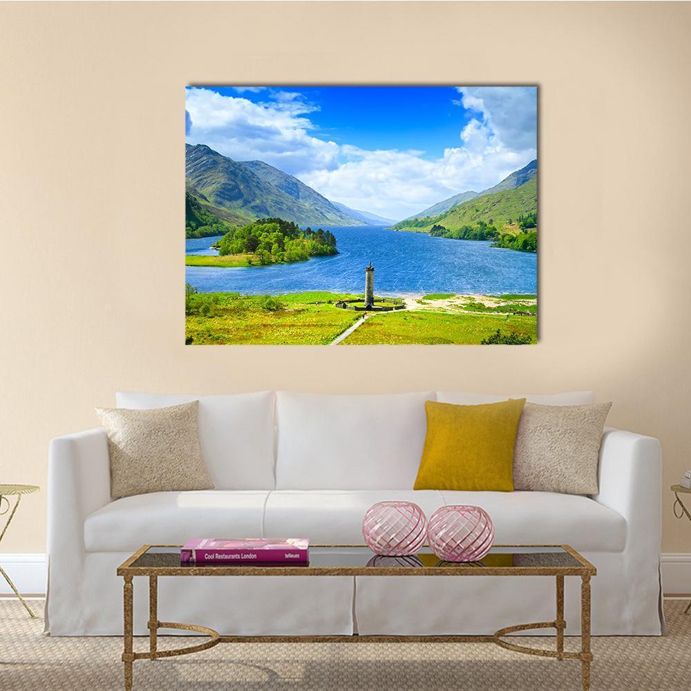 Loch Shiel Lake with Stone Monument Canvas Wall Art in gray, green and blue, single panel hung on a wall