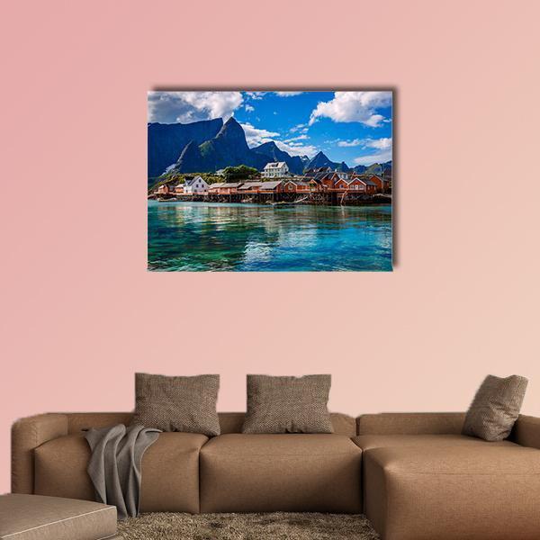 Lofoten Village by Turquoise Water Canvas Wall Art in brown, green and blue, single panel hung on a wall