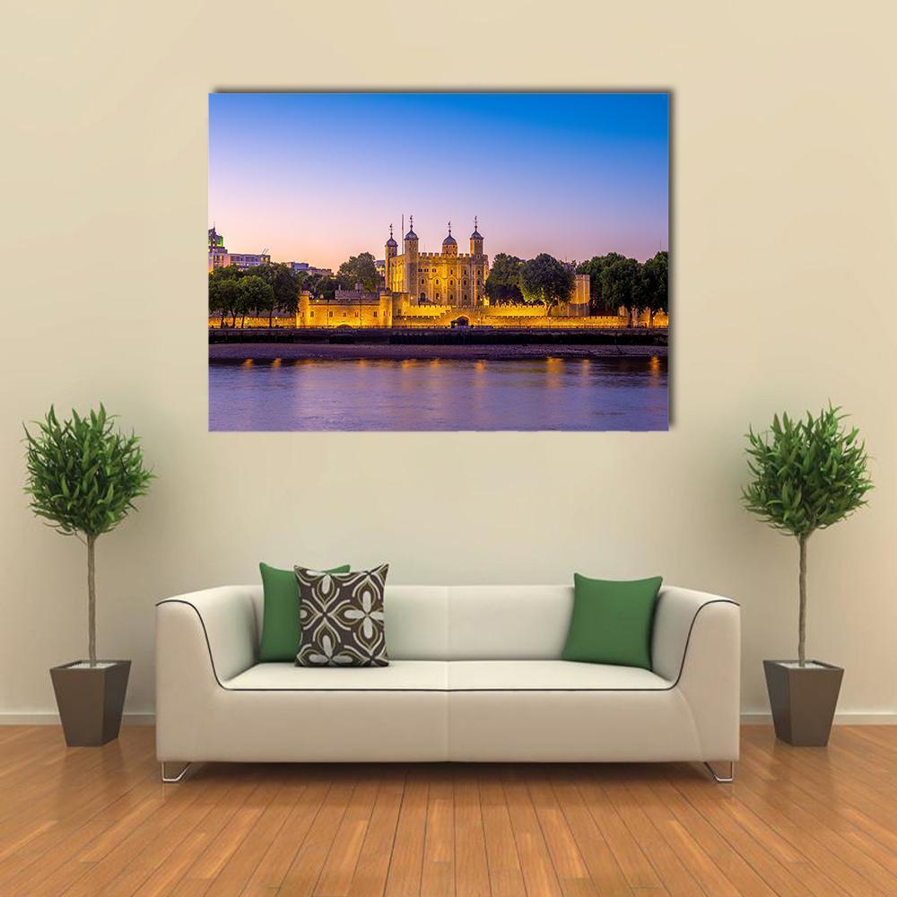 Tower of London at Night Canvas Wall Art in yellow, blue and purple, single panel hung on a wall