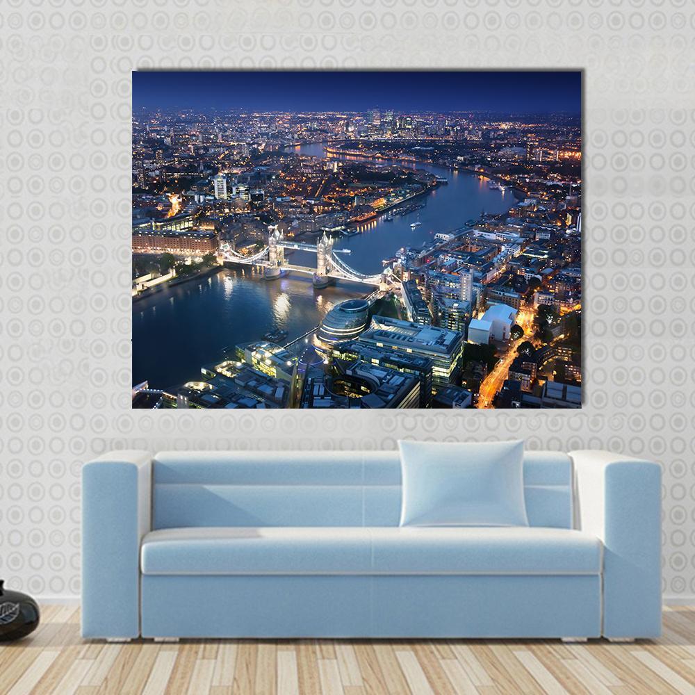 London Tower Bridge at Night Canvas Wall Art in black, blue and navy, single panel hung on a wall