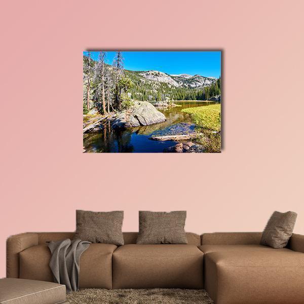 Lone Pine Lake with Rocks Canvas Wall Art in gray, green and blue, single panel hung on a wall