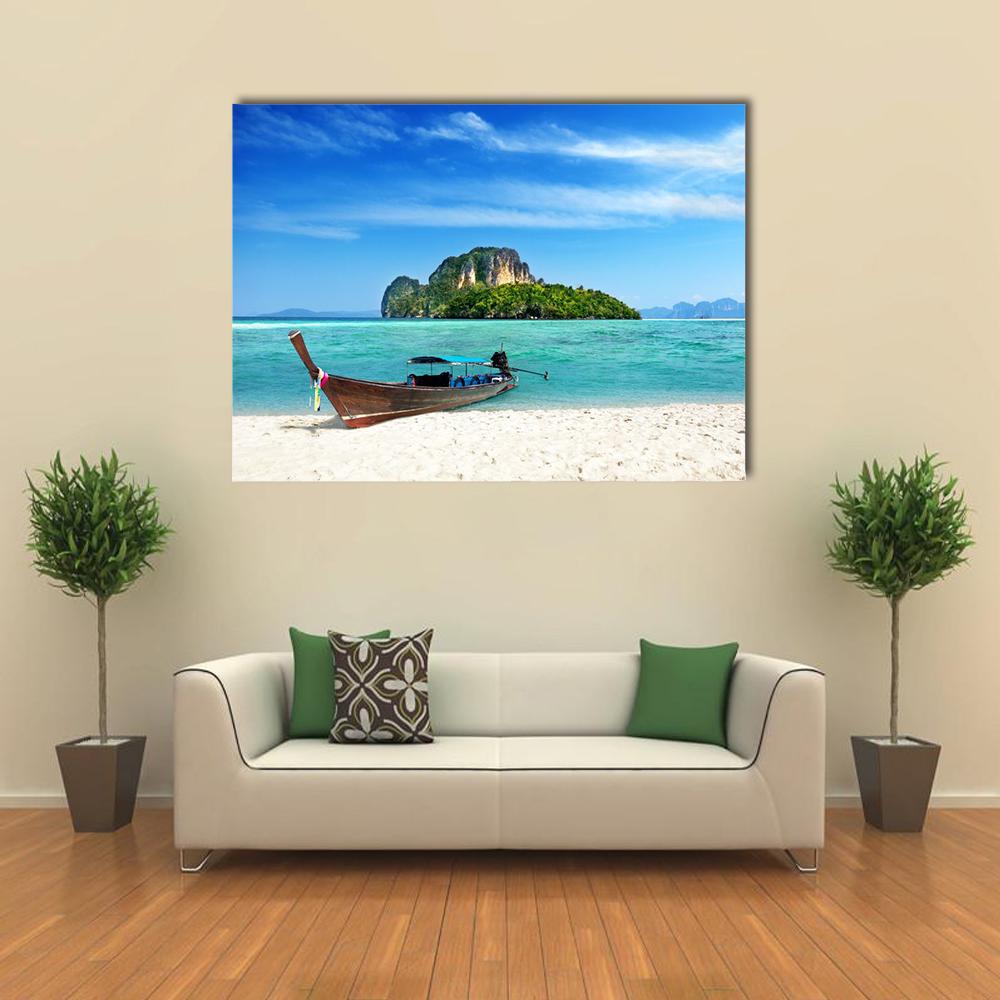 Thai Longtail Boat on Turquoise Beach Canvas Wall Art in white and blue, single panel hung on a wall