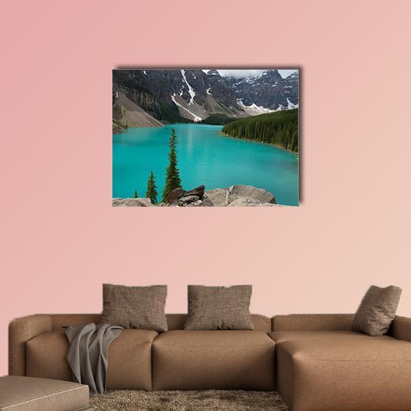 Loraine Lake Canvas Wall Art in gray, green and blue, single panel hung on a wall