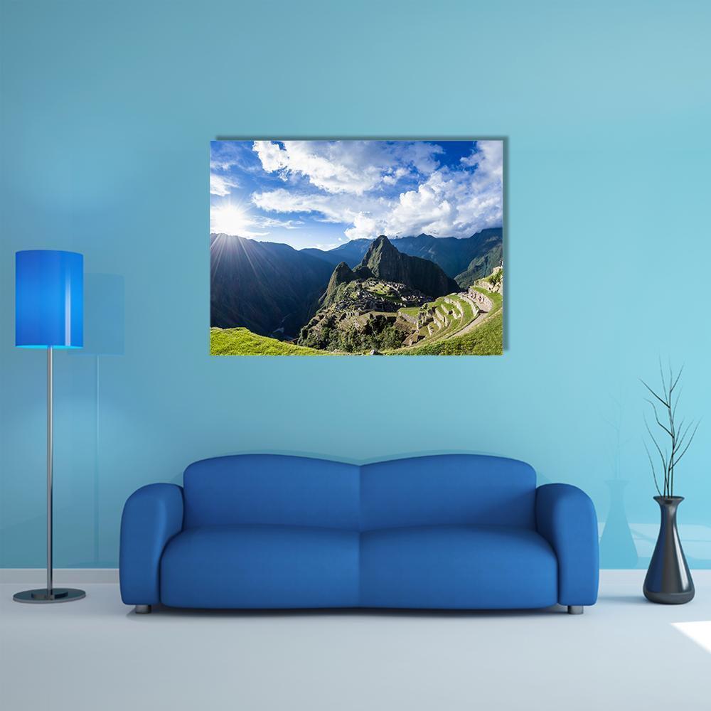 Sunlit Machu Picchu Terraces Canvas Wall Art in white, green and blue, single panel hung on a wall