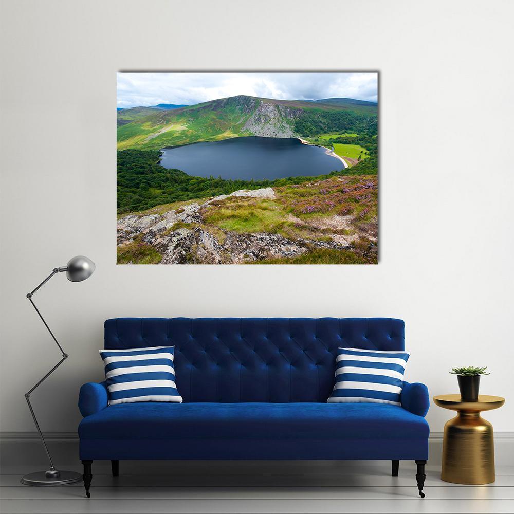 Lough Tay Lake Canvas Wall Art in gray, green and blue, single panel hung on a wall