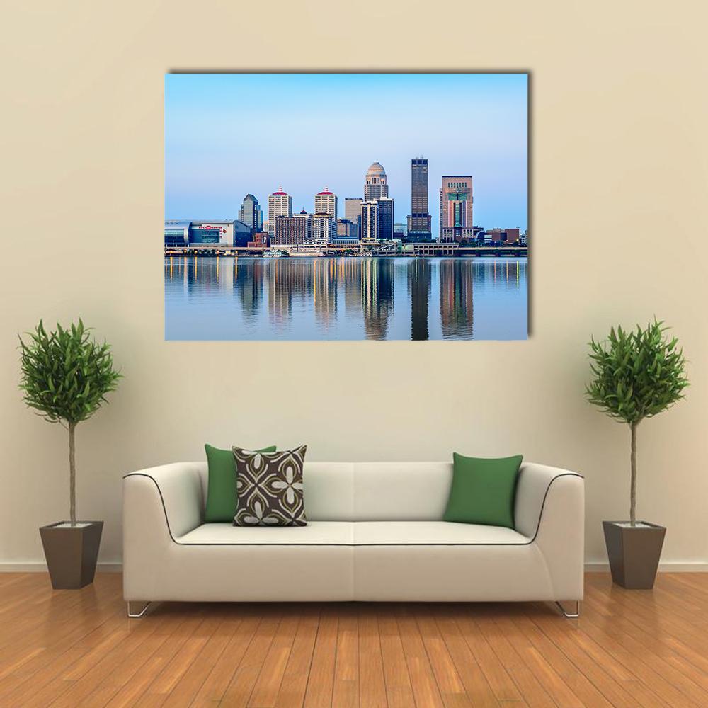 Louisville Skyline at Sunrise Canvas Wall Art in gray and blue, single panel hung on a wall