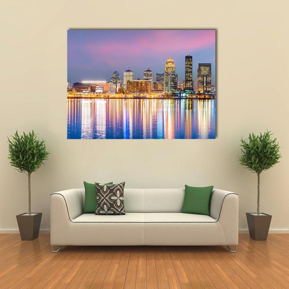 Downtown Louisville Skyline Canvas Wall Art in yellow, blue and pink, single panel hung on a wall